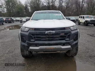 2023 Chevrolet Colorado 4WD Trail Boss with VIN 1GCPTEEK5P1255504, listed as a Copart auction lot 87727235 with 23,817 mi miles and Salvage Title. Bid and sale history available at carsss.com. Image 5.