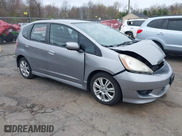 2009 Honda Fit Sport with VIN JHMGE88429S059170, listed as a IAAI auction lot 42091260 with 135,822 mi miles. Bid and sale history available at carsss.com. Image 1.