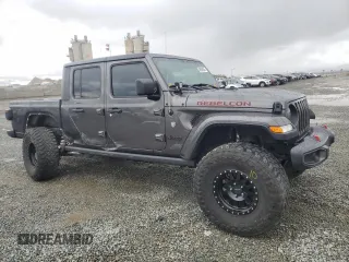 2021 Jeep Gladiator Sport S with VIN 1C6JJTAG0ML508141, listed as a Copart auction lot 48890065 with 44,583 mi miles and Salvage title. Bid and sale history available at DreamBid. Image 4.