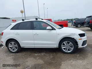 2018 Audi Q3 Premium with VIN WA1BCCFS1JR010439, listed as a IAAI auction lot 41641231 with 108,605 mi miles. Bid and sale history available at carsss.com. Image 14.