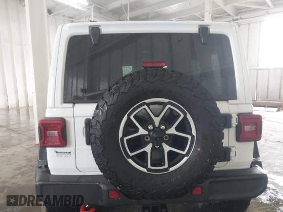2024 Jeep Wrangler Rubicon with VIN 1C4PJXFG7RW334190, listed as a IAAI auction lot 42332948 with 14,272 mi miles and . Bid and sale history available at DreamBid. Image 16.