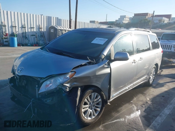 2012 Toyota Sienna XLE AAS with VIN 5TDYK3DC0CS243912, listed as a IAAI auction lot 41758833 with 132,008 mi miles and . Bid and sale history available at DreamBid. Image 2.