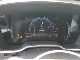 2023 Toyota Corolla Cross XLE with VIN 7MUDAABGXPV060797, listed as a Copart auction lot 62110665 with 18,293 mi miles and Salvage title. Bid and sale history available at DreamBid. Image 9.