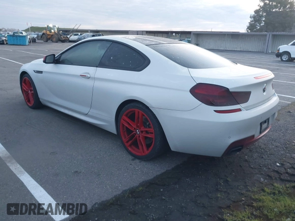2013 BMW 6 Series 650i with VIN WBAYM9C57DDW20312, listed as a IAAI auction lot 41861212 with 98,662 mi miles and . Bid and sale history available at carsss.com. Image 3.