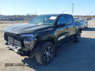 2023 GMC Canyon 4WD AT4 with VIN 1GTP6DEK1P1174713, listed as a IAAI auction lot 41733242 with 35,705 mi miles. Bid and sale history available at carsss.com. Image 2.