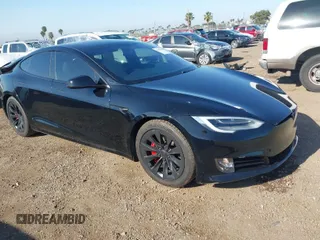 2020 Tesla Model S Long Range with VIN 5YJSA1E24LF381878, listed as a IAAI auction lot 41965340 with 47,468 mi miles. Bid and sale history available at carsss.com. Image 1.