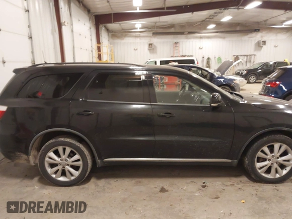 2012 Dodge Durango Crew with VIN 1C4SDJDT6CC205946, listed as a IAAI auction lot 41531175 with 211,372 mi miles and . Bid and sale history available at carsss.com. Image 13.