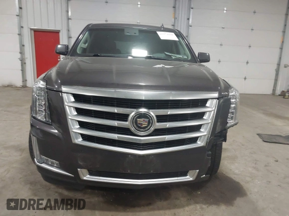 2015 Cadillac Escalade Premium with VIN 1GYS4CKJ8FR308617, listed as a IAAI auction lot 41974608 with 154,014 mi miles and . Bid and sale history available at DreamBid. Image 12.