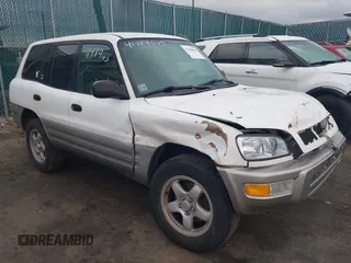 1998 Toyota RAV4 with VIN JT3GP10V9W7031439, listed as a IAAI auction lot 41489043 with 127,726 mi miles and . Bid and sale history available at DreamBid. Image 1.