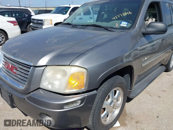 2006 GMC Envoy SLT with VIN 1GKDS13S462185122, listed as a IAAI auction lot 41778816 with 220,974 mi miles. Bid and sale history available at carsss.com. Image 6.