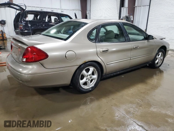 2003 Ford Taurus SE Standard with VIN 1FAFP53U83G228072, listed as a Copart auction lot 57486335 with 93,451 mi miles and Salvage title. Bid and sale history available at DreamBid. Image 3.