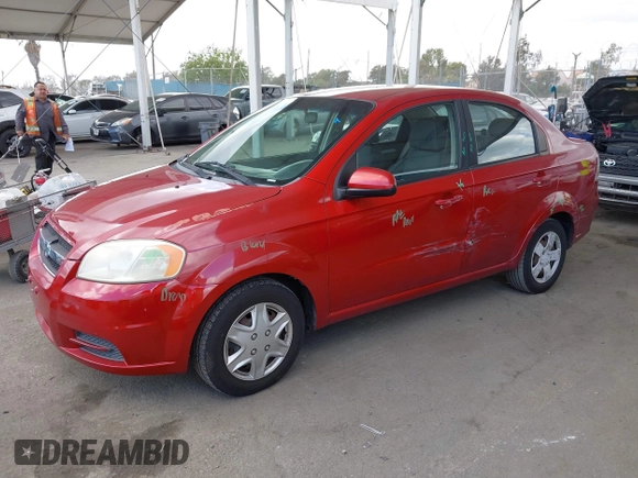 2011 Chevrolet Aveo 1LT z VIN KL1TD5DE7BB127119, wystawiony jako IAAI lot #42064978 z przebiegiem 123 550 mil mil oraz . Historia ofert i sprzedaży dostępna na DreamBid. Obrazek 2.