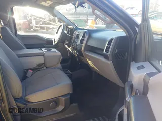 2015 Ford F-150 XLT with VIN 1FTEW1E86FFC00959, listed as a IAAI auction lot 41581711 with 130,298 mi miles. Bid and sale history available at carsss.com. Image 5.