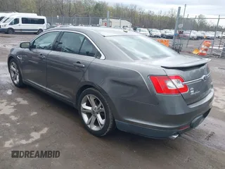 2011 Ford Taurus SHO with VIN 1FAHP2KT8BG100347, listed as a IAAI auction lot 41964597 with 104,603 mi miles and . Bid and sale history available at DreamBid. Image 3.