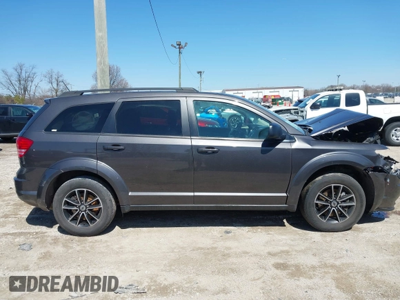 2018 Dodge Journey SE with VIN 3C4PDCAB5JT195635, listed as a IAAI auction lot 41987188 with 133,598 mi miles and . Bid and sale history available at DreamBid. Image 14.