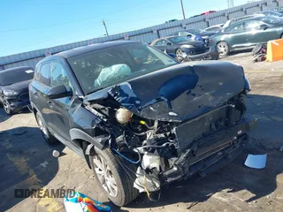 2021 Hyundai Tucson SE with VIN KM8J23A40MU334847, listed as a IAAI auction lot 41817556 with 63,000 mi miles and . Bid and sale history available at DreamBid. Image 1.