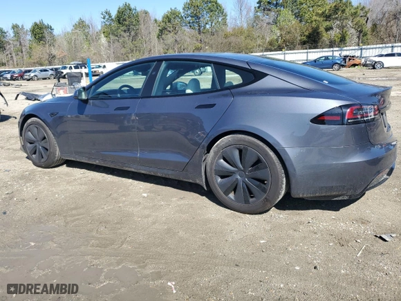 2023 Tesla Model S with VIN 5YJSA1E54PF516907, listed as a Copart auction lot 49372825 with 24,556 mi miles and Salvage Title. Bid and sale history available at carsss.com. Image 2.