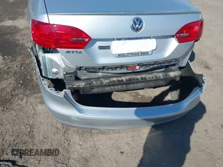 2014 Volkswagen Jetta TDI w/Premium with VIN 3VWLL7AJ2EM359341, listed as a IAAI auction lot 42030959 with 74,273 mi miles and . Bid and sale history available at DreamBid. Image 12.