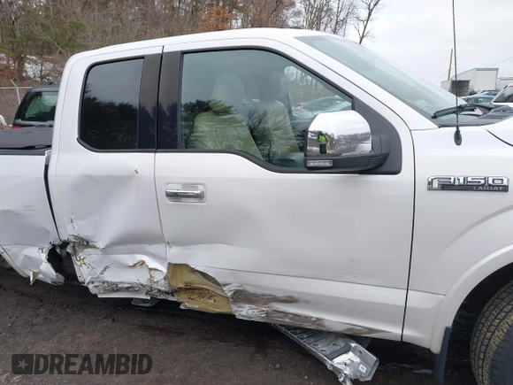 2015 Ford F-150 XLT with VIN 1FTFX1EF5FKD23434, listed as a IAAI auction lot 41613023 with 151,905 mi miles and . Bid and sale history available at DreamBid. Image 13.