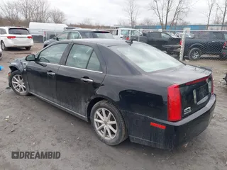 2009 Cadillac STS AWD z VIN 1G6DD67V290140111, wystawiony jako IAAI lot #41800236 z przebiegiem 81 913 mil mil oraz . Historia ofert i sprzedaży dostępna na DreamBid. Obrazek 3.