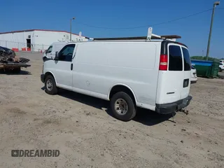 2009 Chevrolet Express Cargo Van with VIN 1GCGG25C791125061, listed as a IAAI auction lot 42131397 with 247,397 mi miles. Bid and sale history available at carsss.com. Image 3.