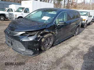 2021 Toyota Sienna LE z VIN 5TDKRKEC9MS043364, wystawiony jako IAAI lot #41515918 z przebiegiem 98 028 mil mil oraz . Historia ofert i sprzedaży dostępna na DreamBid. Obrazek 2.