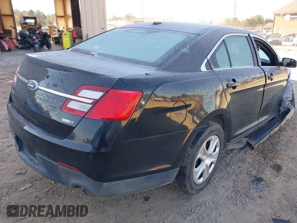 2014 Ford Police Interceptor z VIN 1FAHP2MK3EG124483, wystawiony jako IAAI lot #41018811 z przebiegiem 200 626 mil mil oraz . Historia ofert i sprzedaży dostępna na DreamBid. Obrazek 4.
