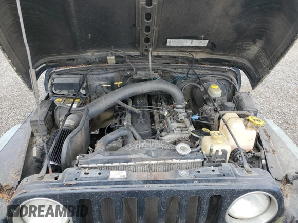 1998 Jeep Wrangler Sport z VIN 1J4FY19S7WP801709, wystawiony jako Copart lot #64495985 z przebiegiem 260 798 mil mil oraz Czysty tytuł • Clean title. Historia ofert i sprzedaży dostępna na DreamBid. Obrazek 11.