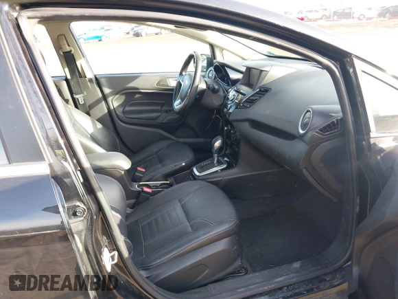 2014 Ford Fiesta Titanium z VIN 3FADP4FJXEM127644, wystawiony jako IAAI lot #41555040 z przebiegiem 107 046 mil mil oraz . Historia ofert i sprzedaży dostępna na DreamBid. Obrazek 5.