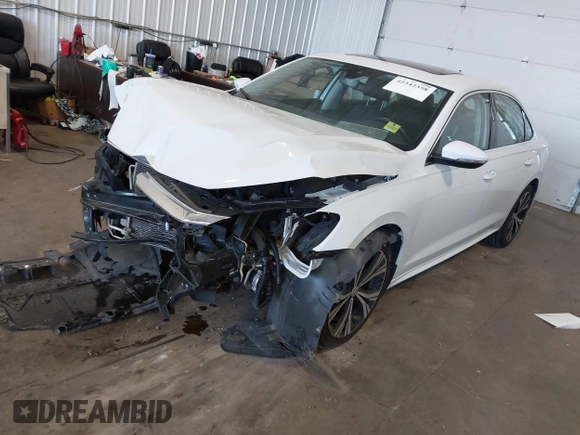 2021 Volkswagen Passat SE with VIN 1VWSA7A30MC014179, listed as a IAAI auction lot 42342358 with 77,535 mi miles and . Bid and sale history available at DreamBid. Image 17.
