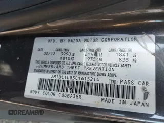2012 Mazda 3 i Touring with VIN JM1BL1L85C1615214, listed as a IAAI auction lot 42563686 with 151,135 mi miles and . Bid and sale history available at DreamBid. Image 9.