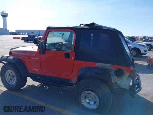 2005 Jeep Wrangler Sport with VIN 1J4FA49S85P344204, listed as a IAAI auction lot 41769319 with 105,927 mi miles. Bid and sale history available at carsss.com. Image 6.