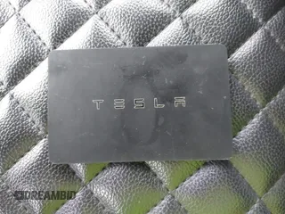 2020 Tesla Model Y Long Range with VIN 5YJYGDEF0LF000380, listed as a IAAI auction lot 41867489 with 66,294 mi miles and . Bid and sale history available at DreamBid. Image 11.