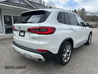 2019 BMW X5 xDrive40i with VIN 5UXCR6C56KLK99829, listed as a IAAI auction lot 41902835 with 165,939 mi miles. Bid and sale history available at carsss.com. Image 4.