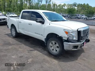 2018 Nissan Titan S with VIN 1N6AA1EJ9JN532437, listed as a IAAI auction lot 42597777 with 140,469 mi miles and . Bid and sale history available at DreamBid. Image 1.