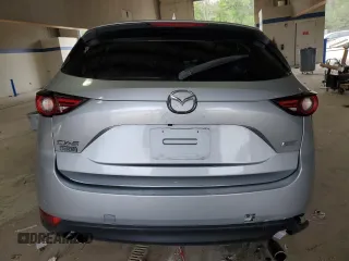 2018 Mazda CX-5 Grand Touring with VIN JM3KFADM4J0349097, listed as a Copart auction lot 59912875 with Not provided miles and Non repairable. Bid and sale history available at DreamBid. Image 6.
