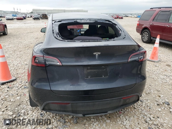 2024 Tesla Model Y with VIN 7SAYGDEDXRA322676, listed as a Copart auction lot 55664125 with 8,788 mi miles and Clean title. Bid and sale history available at DreamBid. Image 6.