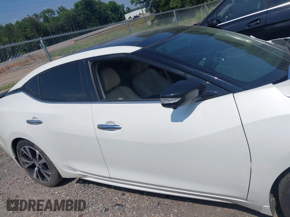 2017 Nissan Maxima S with VIN 1N4AA6APXHC371182, listed as a IAAI auction lot 42596000 with 159,710 mi miles and . Bid and sale history available at DreamBid. Image 13.