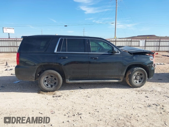 2019 Chevrolet Tahoe Commercial z VIN 1GNLCDEC4KR295348, wystawiony jako IAAI lot #41225134 z przebiegiem Nie podano mil oraz . Historia ofert i sprzedaży dostępna na DreamBid. Obrazek 13.