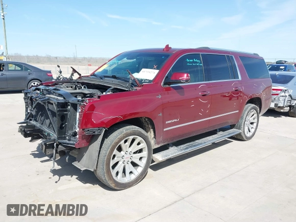 2020 GMC Yukon XL Denali with VIN 1GKS1HKJ3LR238701, listed as a IAAI auction lot 41724274 with 107,323 mi miles and . Bid and sale history available at DreamBid. Image 2.