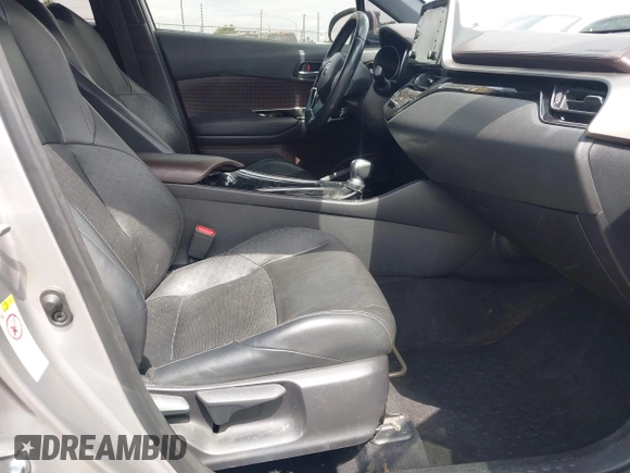 2019 Toyota C-HR XLE with VIN JTNKHMBX3K1016723, listed as a IAAI auction lot 42040571 with 158,804 mi miles. Bid and sale history available at carsss.com. Image 5.