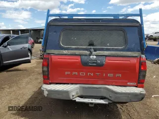 2002 Nissan Frontier XE z VIN 1N6ED29Y12C388949, wystawiony jako Copart lot #55235875 z przebiegiem 212 944 mil mil oraz Szkody całkowita. Historia ofert i sprzedaży dostępna na DreamBid. Obrazek 6.