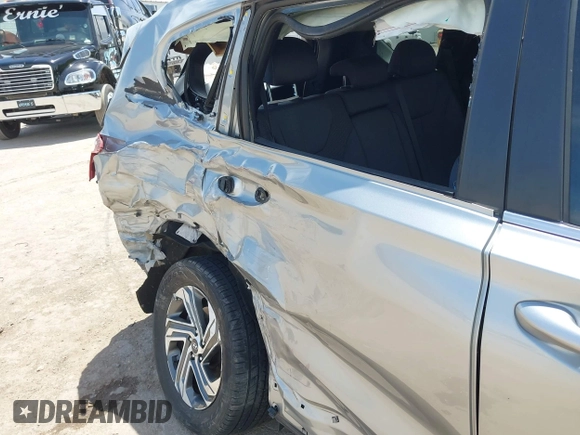 2022 Hyundai Santa Fe SE with VIN 5NMS14AJ7NH393037, listed as a IAAI auction lot 42276818 with 77,656 mi miles and . Bid and sale history available at DreamBid. Image 6.