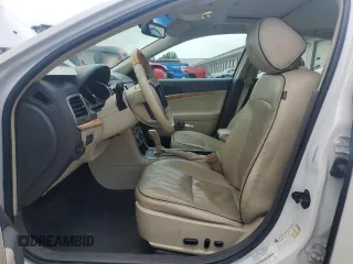 2012 Lincoln MKZ z VIN 3LNHL2JC7CR810191, wystawiony jako Copart lot #59125485 z przebiegiem 154 076 mil mil oraz Szkoda całkowita • Salvage title. Historia ofert i sprzedaży dostępna na DreamBid. Obrazek 7.