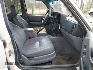1998 Jeep Cherokee Limited with VIN 1J4FJ78S5WL247179, listed as a IAAI auction lot 41738363 with 233,402 mi miles. Bid and sale history available at carsss.com. Image 5.