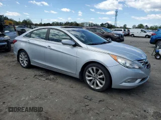 2013 Hyundai Sonata Limited with VIN 5NPEC4AC0DH644006, listed as a Copart auction lot 53040305 with 144,624 mi miles and Salvage Title. Bid and sale history available at DreamBid. Image 4.