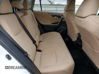 2019 Toyota RAV4 XLE with VIN JTMP1RFV9KD506344, listed as a Copart auction lot 47898145 with 100,718 mi miles and Salvage Title. Bid and sale history available at DreamBid. Image 11.