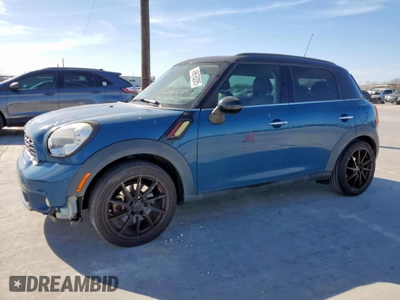 2012 MINI Countryman S with VIN WMWZC3C5XCWM27675, listed as a Copart auction lot 49676205 with 111,499 mi miles and Salvage title. Bid and sale history available at DreamBid. Image 1.