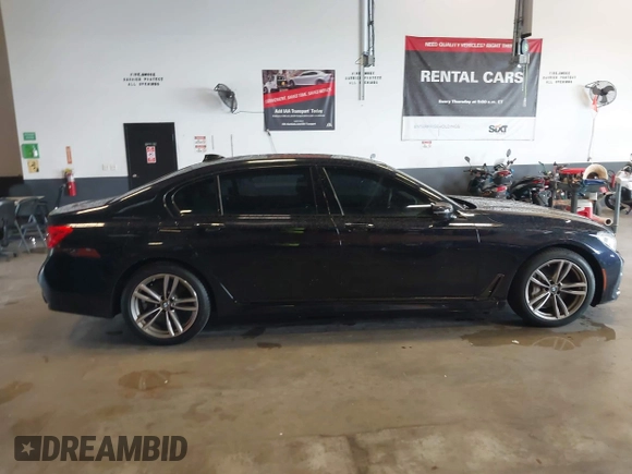 2019 BMW 7 Series 750i xDrive with VIN WBA7F2C51KB239044, listed as a IAAI auction lot 42756026 with 65,028 mi miles and . Bid and sale history available at DreamBid. Image 13.