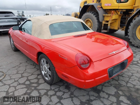 2004 Ford Thunderbird Deluxe z VIN 1FAHP60A14Y106397, wystawiony jako IAAI lot #41466275 z przebiegiem 146 214 mil mil oraz . Historia ofert i sprzedaży dostępna na DreamBid. Obrazek 3.